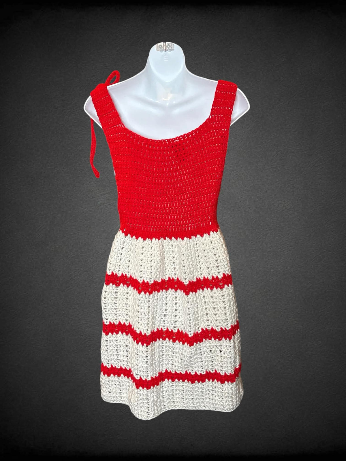 XS red & white homemade crochet dress with striped pattern on skirt, and decorative flower design