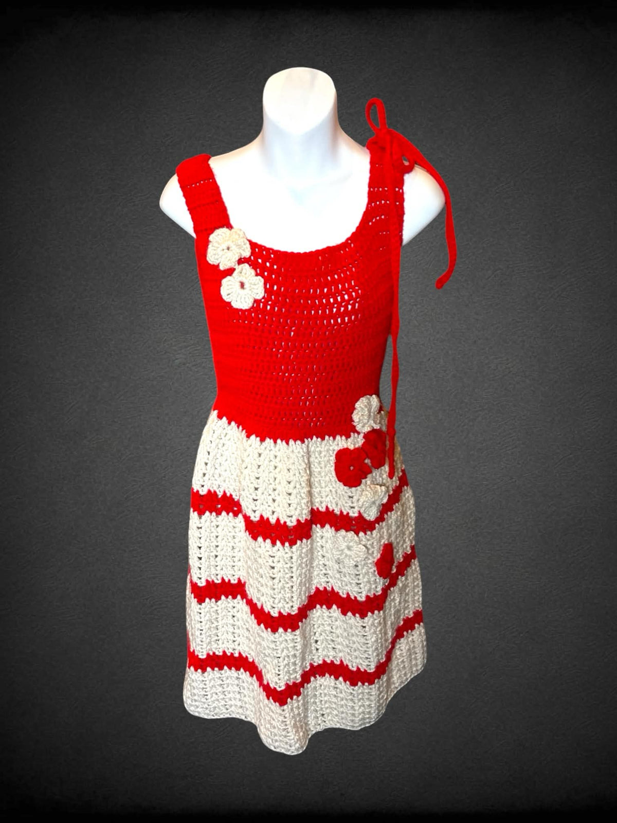 XS red & white homemade crochet dress with striped pattern on skirt, and decorative flower design