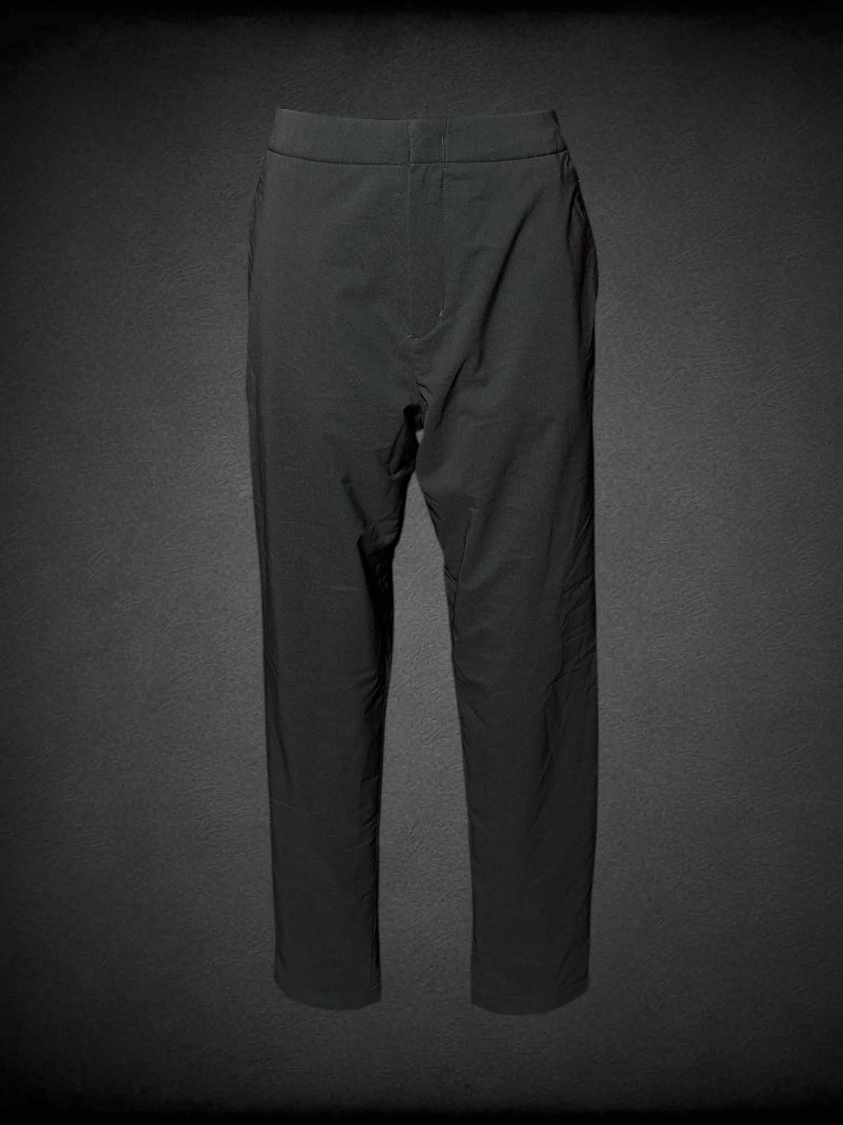 S Heattech black snow pants with fleece inner lining, zipper pockets, and stretch waist