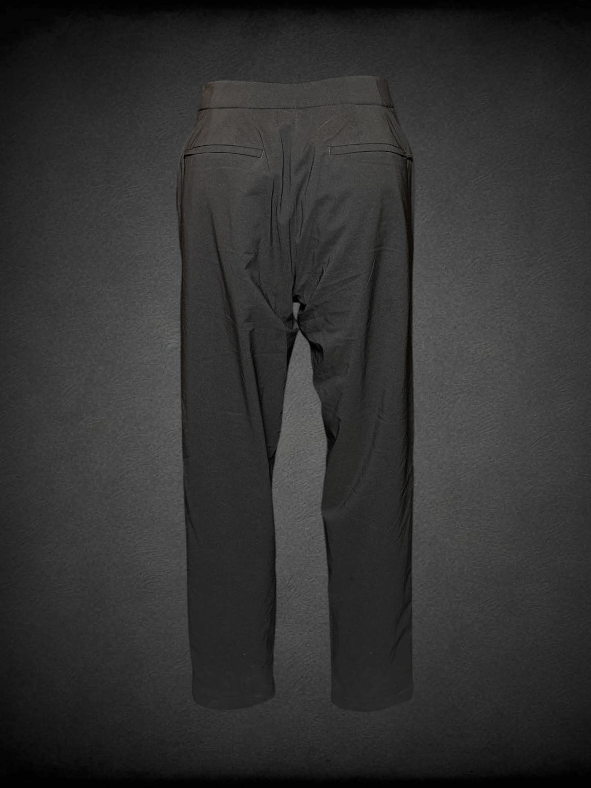 S Heattech black snow pants with fleece inner lining, zipper pockets, and stretch waist