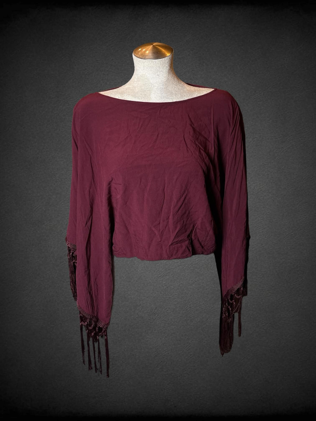 L Haute Society maroon cropped long-sleeve top with tassels on sleeves