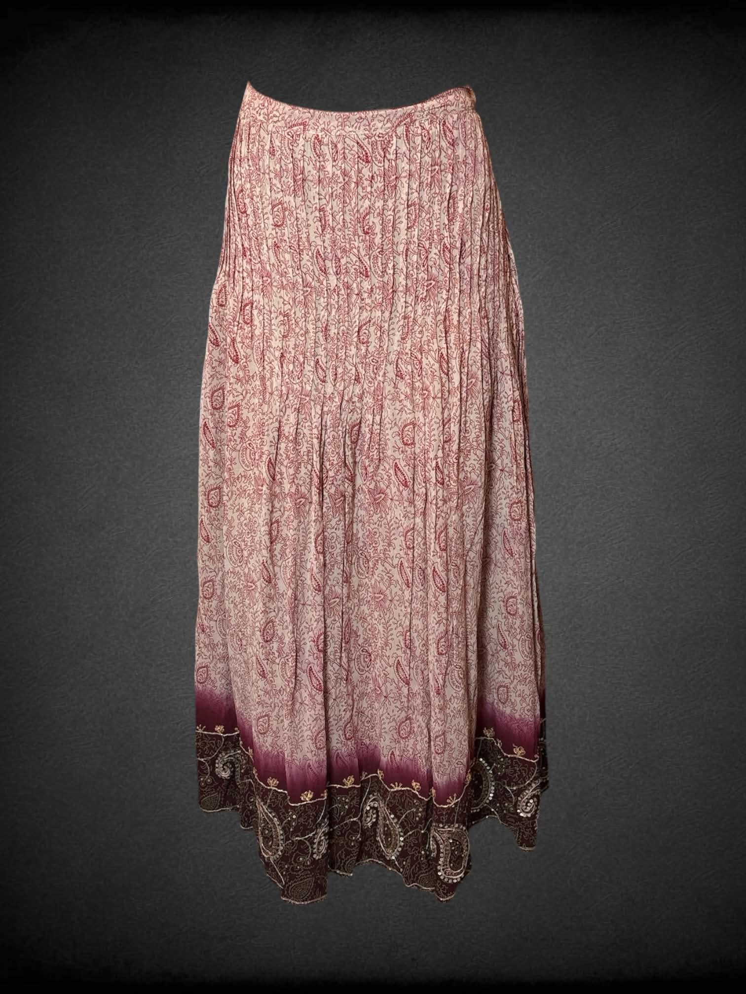 L Soft Surroundings beige pleated skirt with maroon paisley design, zipper and button on side, and sequined pattern on bottom