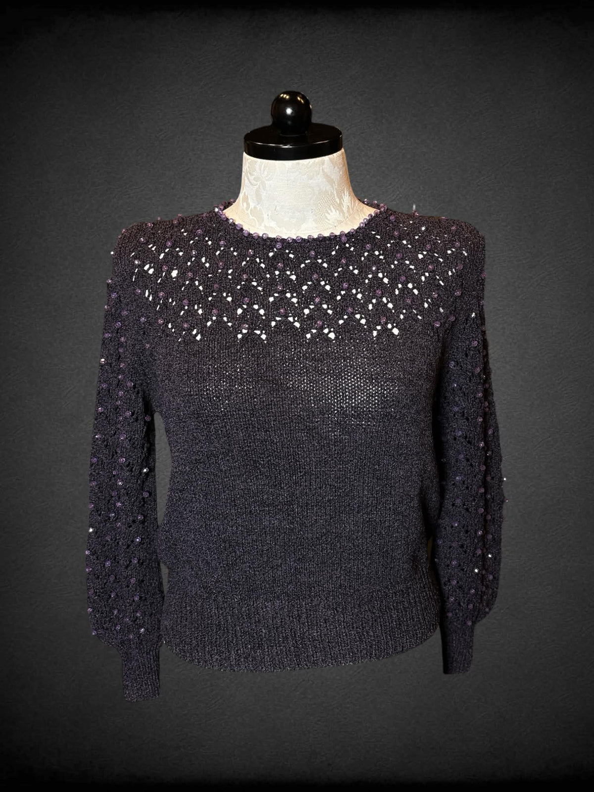 1X purple knit sweater with beaded design