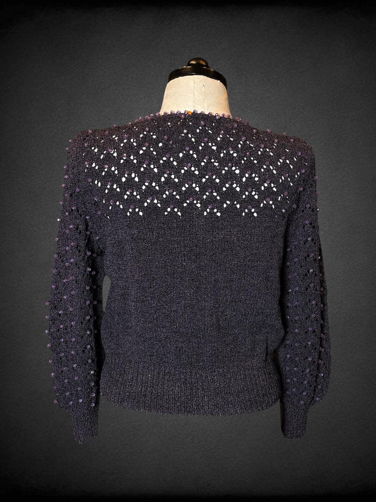 1X purple knit sweater with beaded design