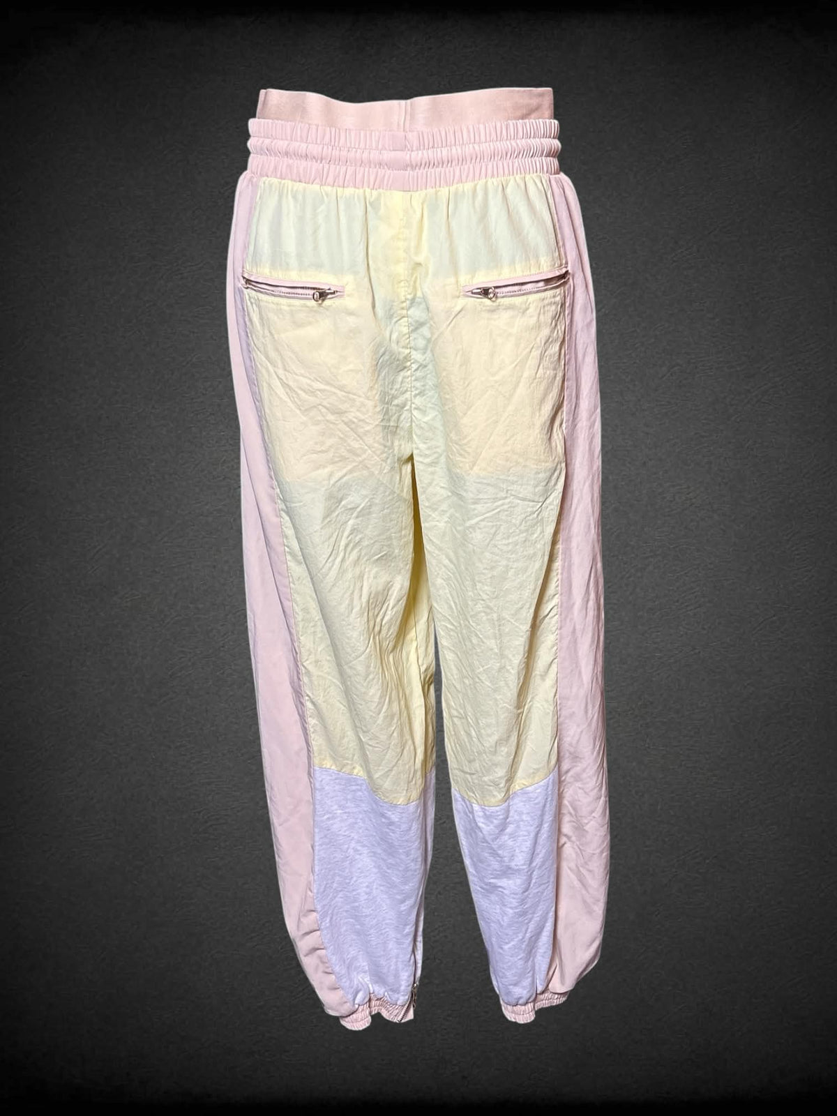 M P.E. Nation yellow semi-sheer color block windbreaker pants with stretch waist