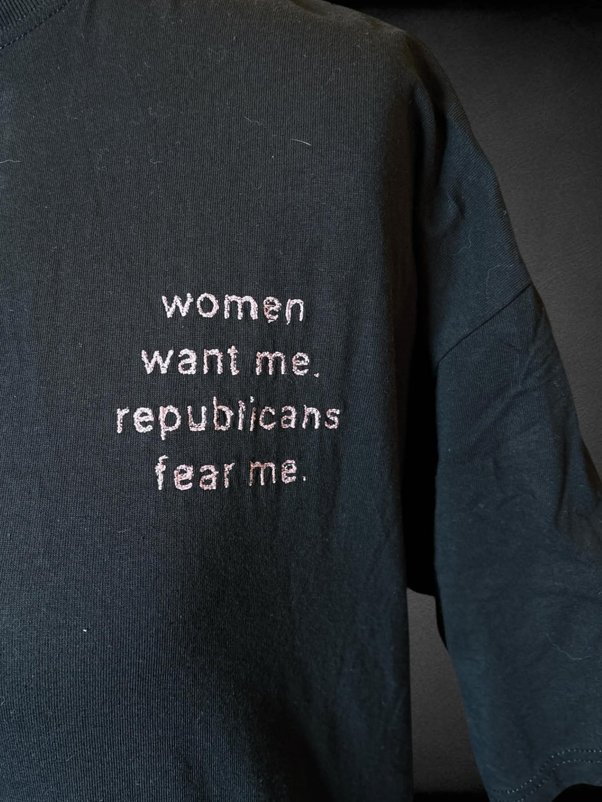 2X M&O Gold black t shirt with embroidered “Women want me, Republicans fear me” writing on front