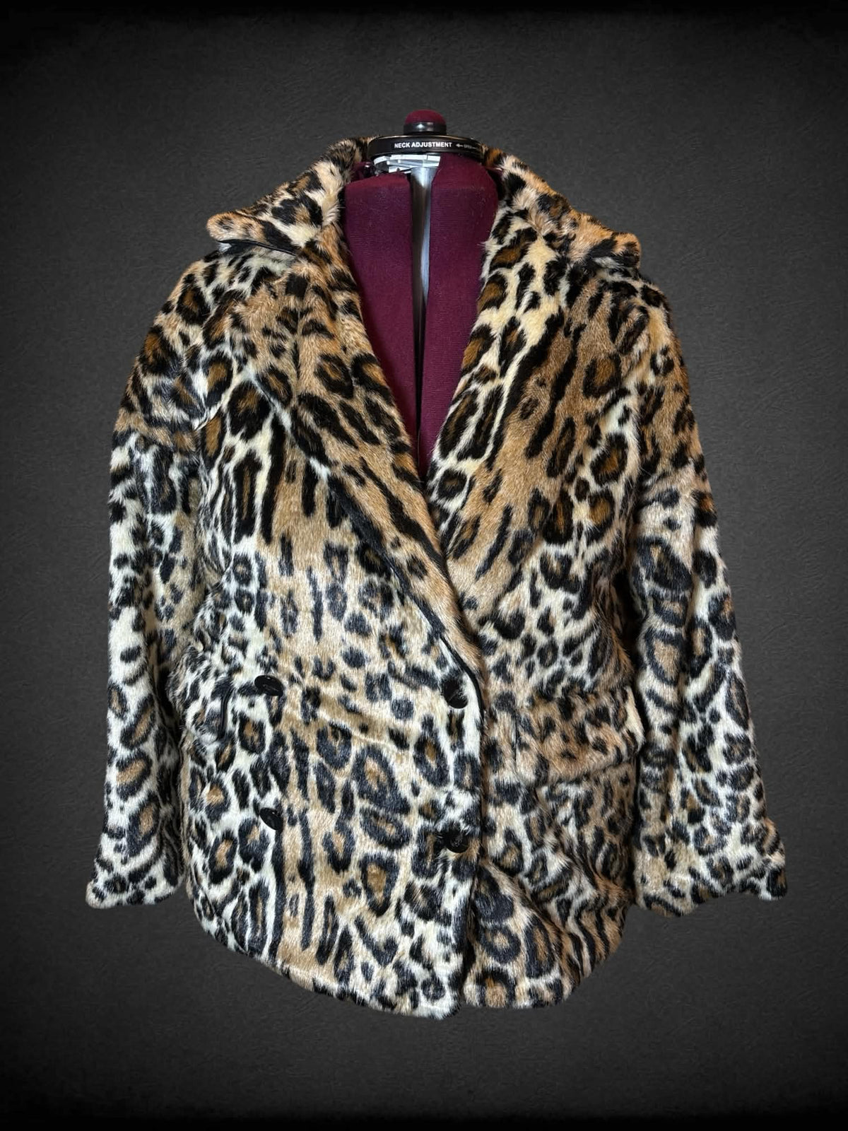 2X Free People brown faux fur coat with leopard print design, and pockets and buttons on front