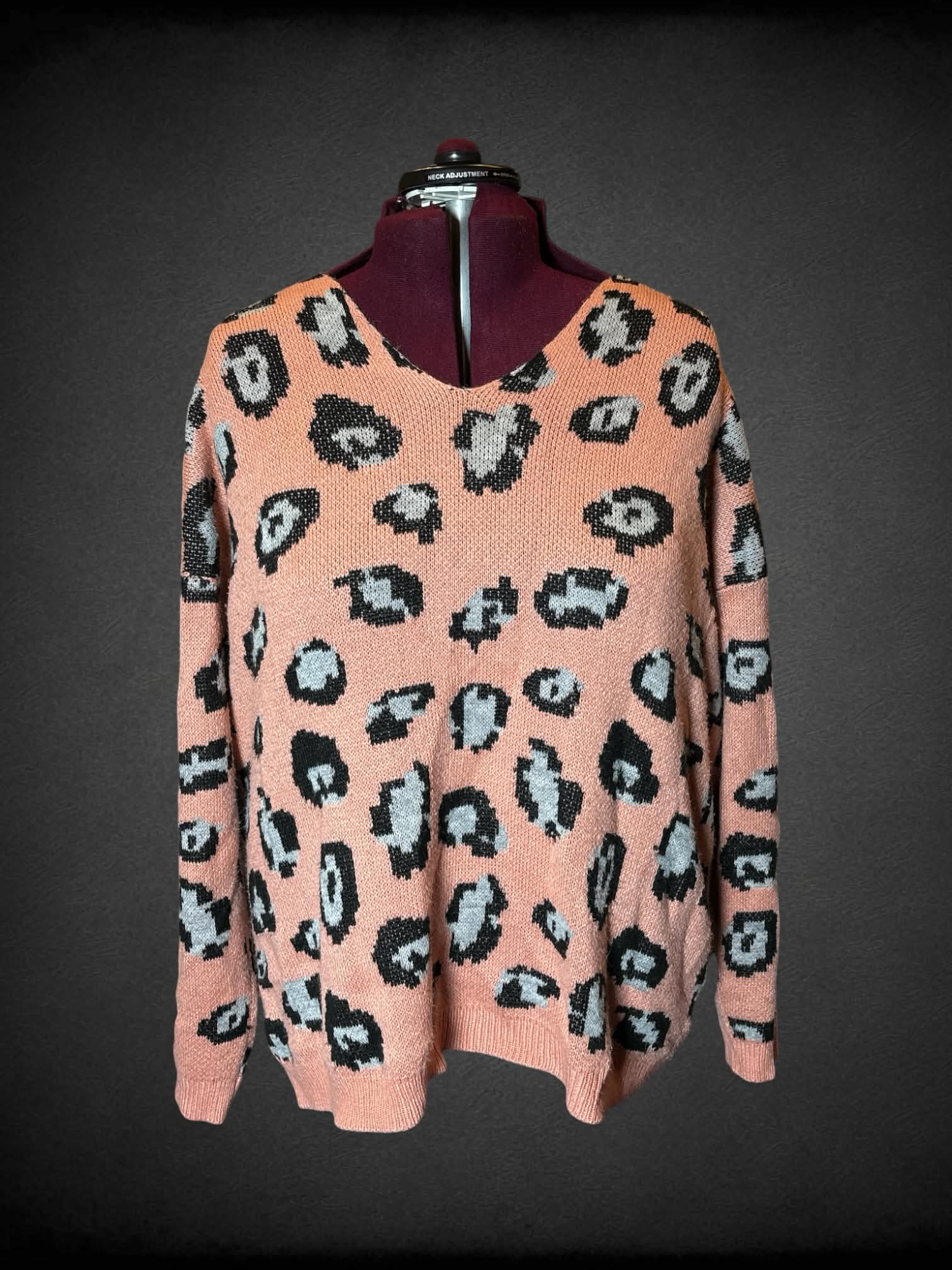 4X Reborn J peach knit sweater with leopard print design