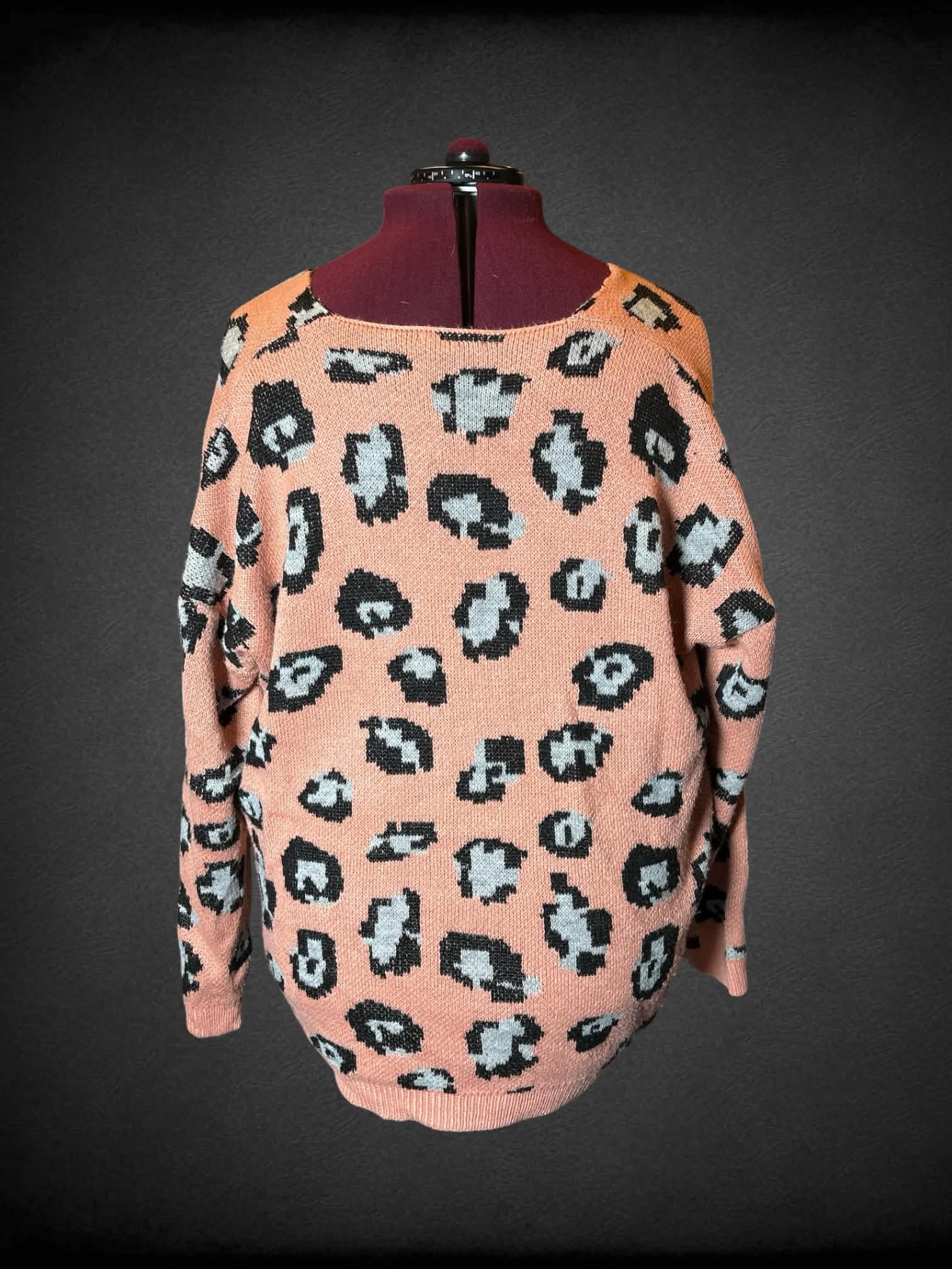 4X Reborn J peach knit sweater with leopard print design