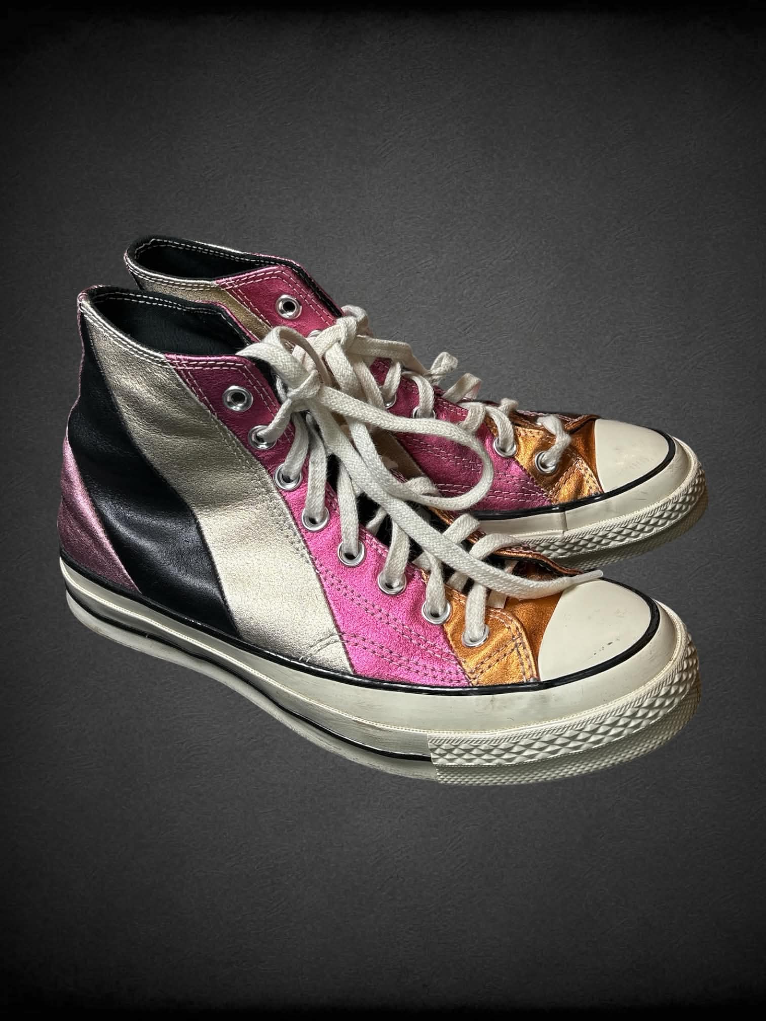 Size 8.5W Converse with shimmery pink, silver and black striped design