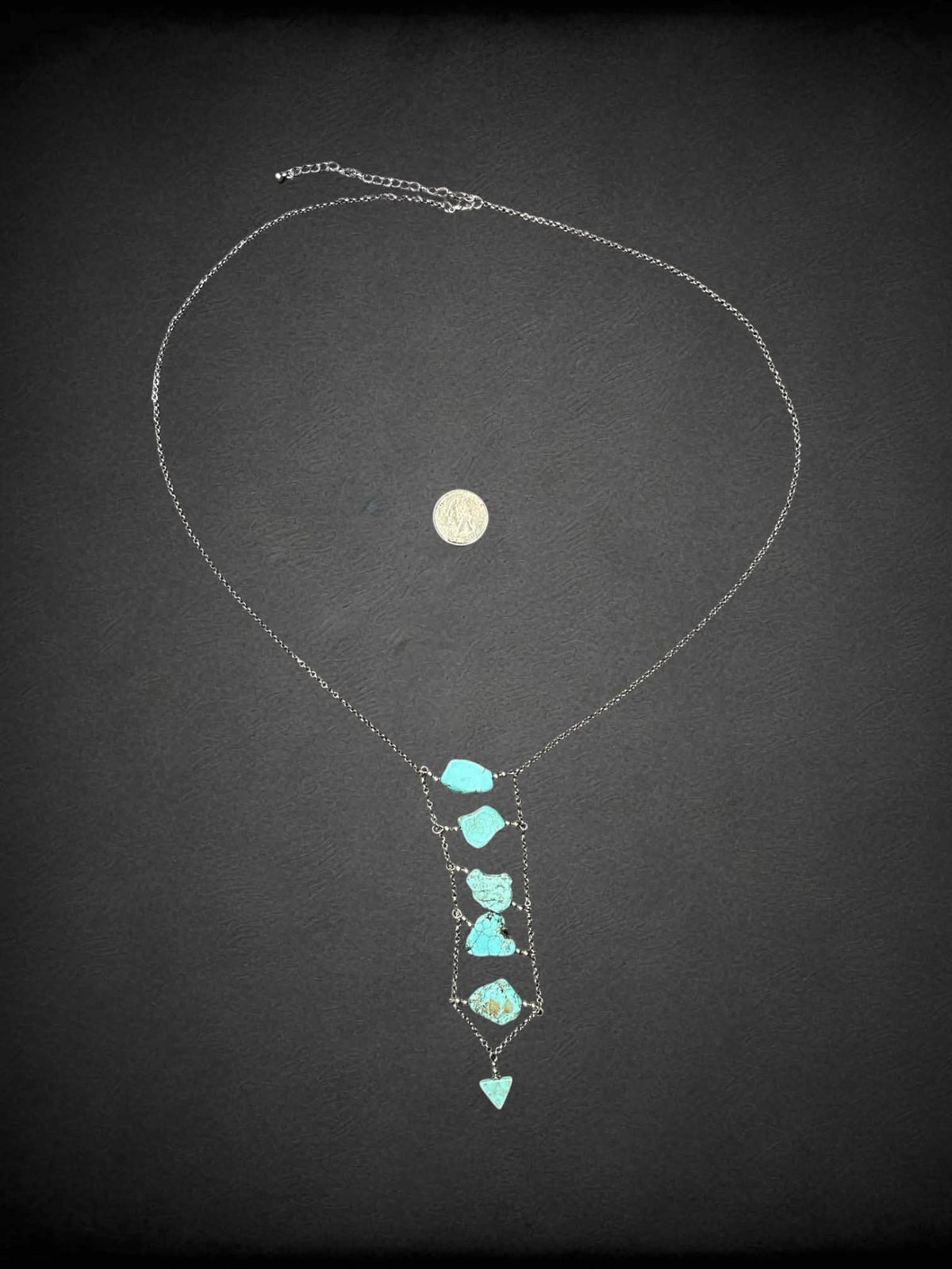 Long silver chain necklace with blue stone charms