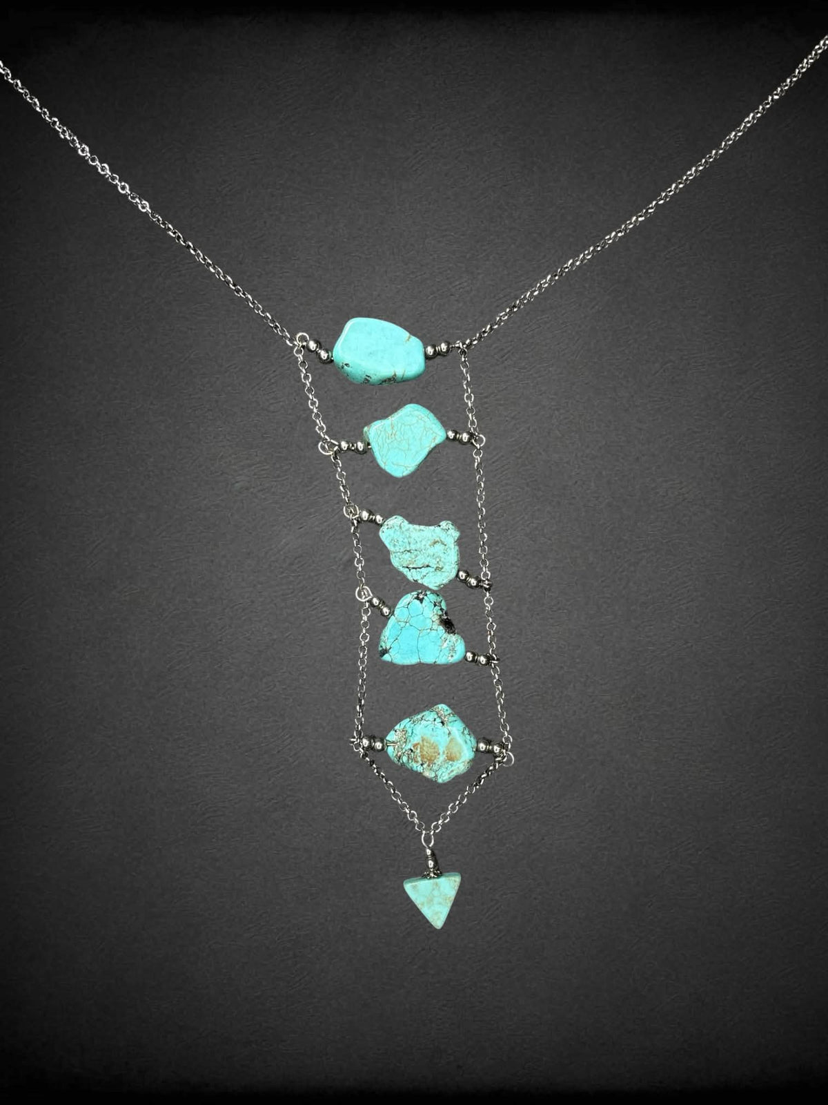 Long silver chain necklace with blue stone charms