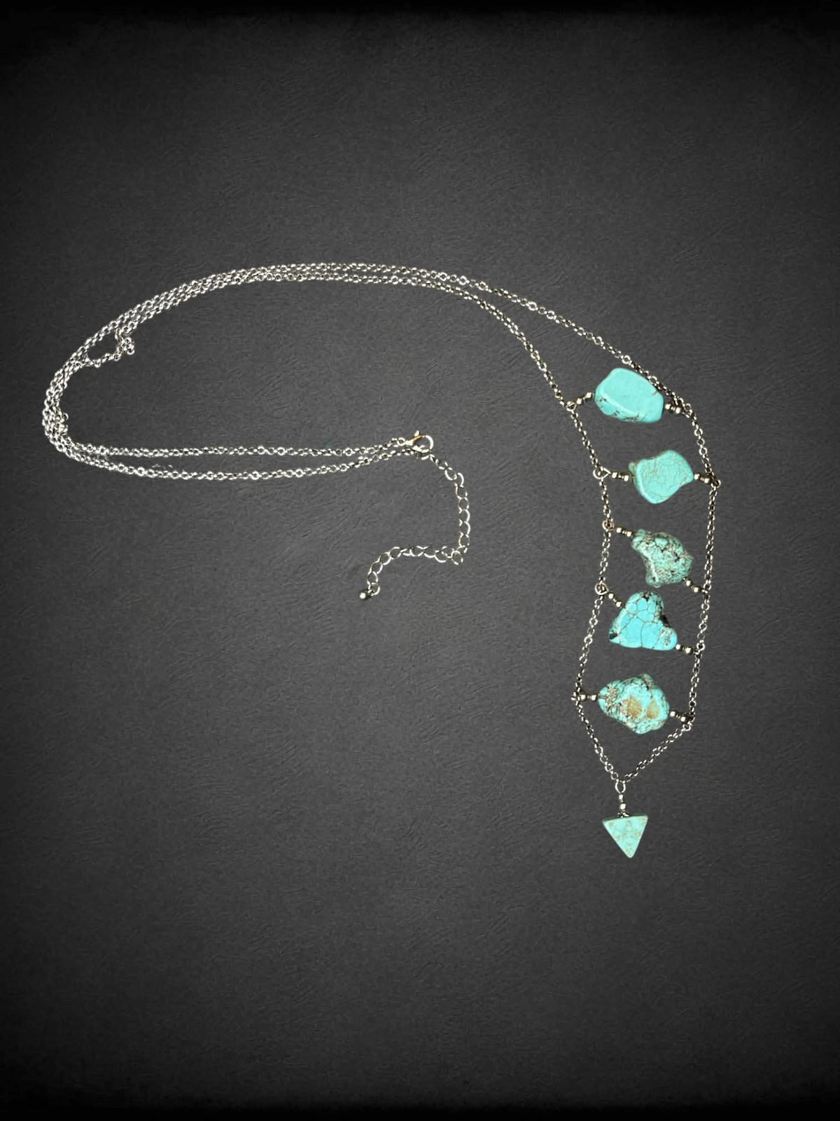 Long silver chain necklace with blue stone charms