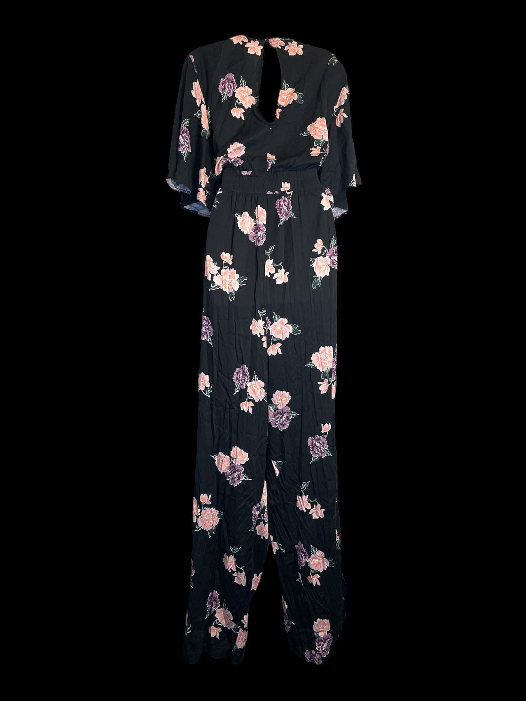2X Black, pink, purple, & green floral pattern short sleeve v-neckline wide leg jumpsuit w/ button keyhole closure, shirred waist, & pockets