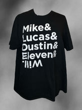 Load image into Gallery viewer, 1X Black &amp; white cotton “Stranger Things” short sleeve crew neckline top w/ “Mike &amp; Lucas &amp; Dustin &amp; Eleven &amp; Mike.” text graphic
