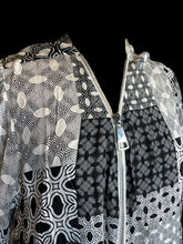 Load image into Gallery viewer, 3X White &amp; black geometric pattern long balloon sleeve zip neckline top w/ large silver-like zipper tab
