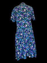 Load image into Gallery viewer, XL Vintage black, blue, purple, &amp; green floral print short sleeve button down dress w/ pleated skirt, button front, folded collar, &amp; chest pocket

