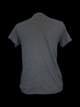 Load image into Gallery viewer, M Heather grey short sleeve crew neck top w/ “Jurassic Park” logo graphic
