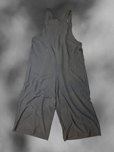Load image into Gallery viewer, 2X Black sleeveless wide leg jumpsuit w/ button adjustable straps, pleating, &amp; pockets
