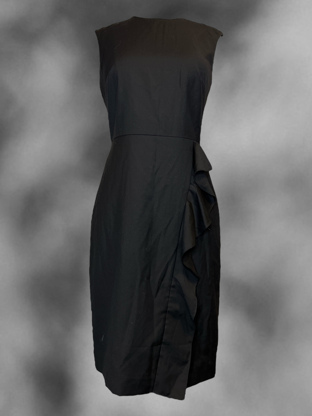 M Black sleeveless round neckline bodycon dress w/ ruffle detail, back hem slit, & clasp/zipper closure