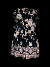 Load image into Gallery viewer, S NWT Black strapless romper w/ pink floral pattern, ruffle detail, pockets, &amp; elastic waist
