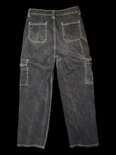 Load image into Gallery viewer, M Black denim straight leg cargo pants w/ green stitching details, belt loops, pockets, &amp; zipper/button closure
