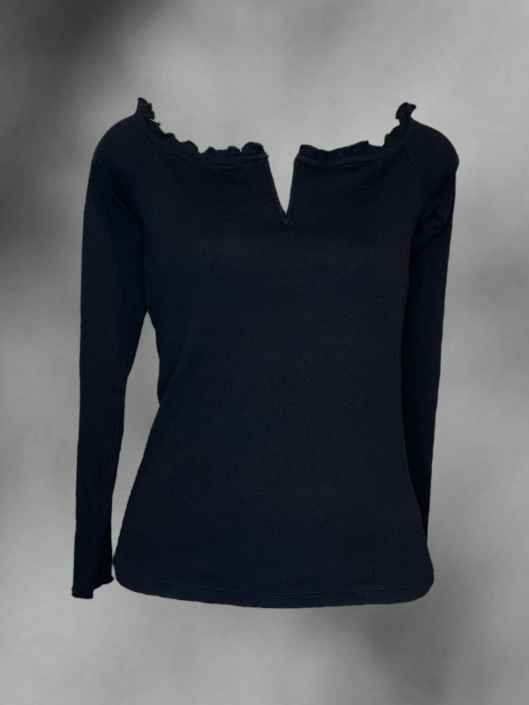 S Black cotton rib knit long sleeve off the shoulder top w/ reinforced notch neckline, & ruffle hem