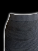 Load image into Gallery viewer, L Black multi texture knit fit &amp; flare skirt w/ elastic waistband, &amp; eyelet details

