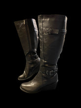 Load image into Gallery viewer, 12W Black faux leather knee high wedge heeled boots w/ side zipper, elastic sides, funky interior pattern, &amp; decorative buckle
