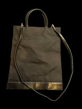 Load image into Gallery viewer, Black canvas &amp; faux leather tote bag w/ removable cross body strap, magnetic clasp, &amp; inner pockets

