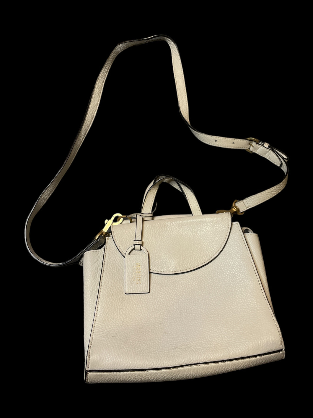 White crossbody frame bag w/ removable strap, handles, outer magnetic snap pockets, inner zipper pocket, & separators