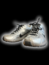 Load image into Gallery viewer, 9 Silver Nike Shox sneakers w/ black geometric line pattern, black swoosh logo, black laces, shock absorber soles, &amp; air hole perferations
