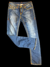 Load image into Gallery viewer, M Blue denim lightly distressed jeans w/ yellow &amp; orange embroidered stitching, jeweled buttons, back flap buttoned pockets, &amp; zipper/button closure
