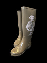 Load image into Gallery viewer, 7 Light brown rain boots w/ large Juicy Couture logo on side, &amp; small logo on heel

