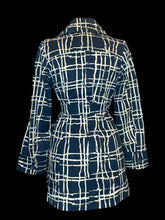 Load image into Gallery viewer, S Blue double breasted jacket w/ white stylized line design, matching belt, pockets, &amp; orange &amp; white polka dot interior
