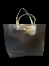 Load image into Gallery viewer, Black pleather tote bag w/ &quot;Christian Siriano Silhouette&quot; gold text
