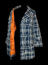 Load image into Gallery viewer, S Blue double breasted jacket w/ white stylized line design, matching belt, pockets, &amp; orange &amp; white polka dot interior
